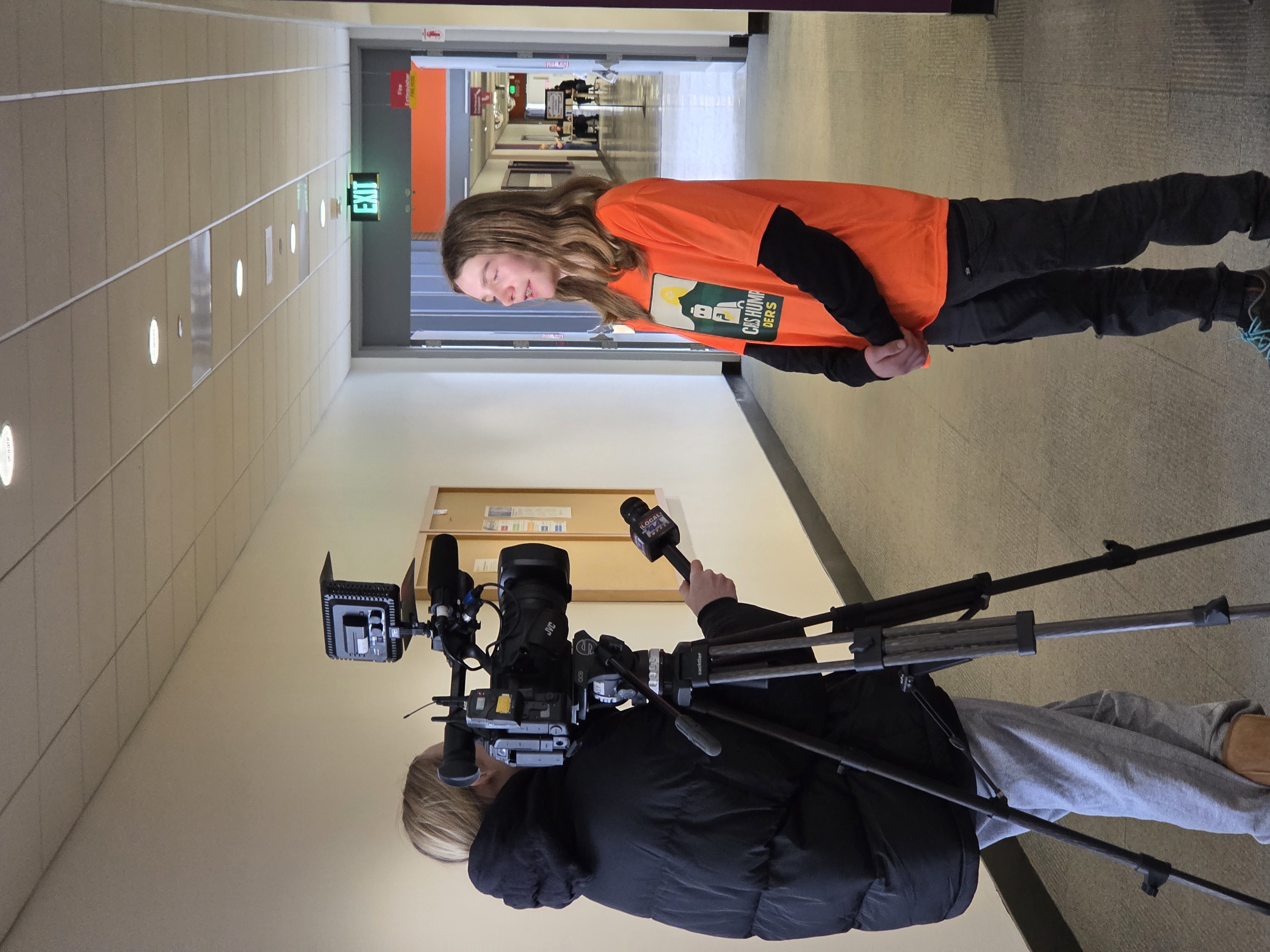 A team member being interviewed at an FLL competition