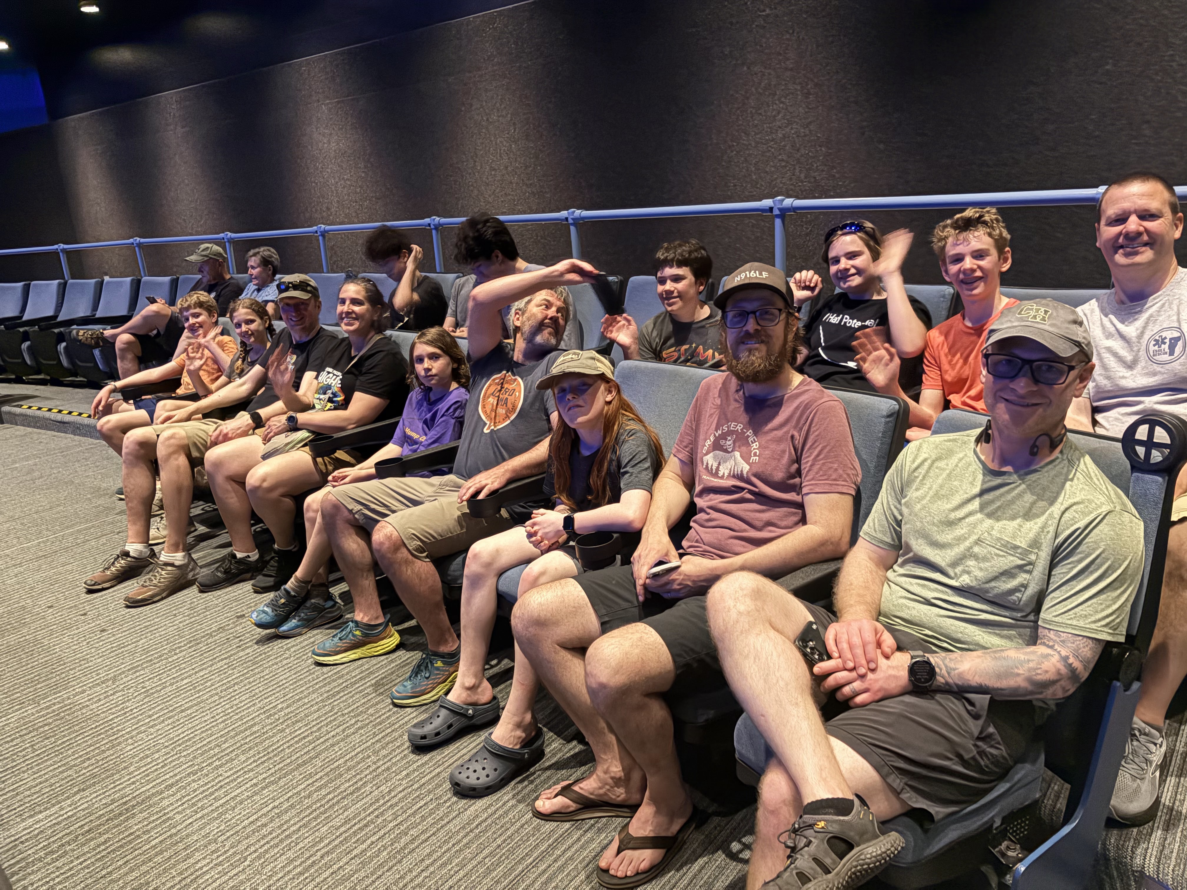 Team members and supporters seated together at an event
