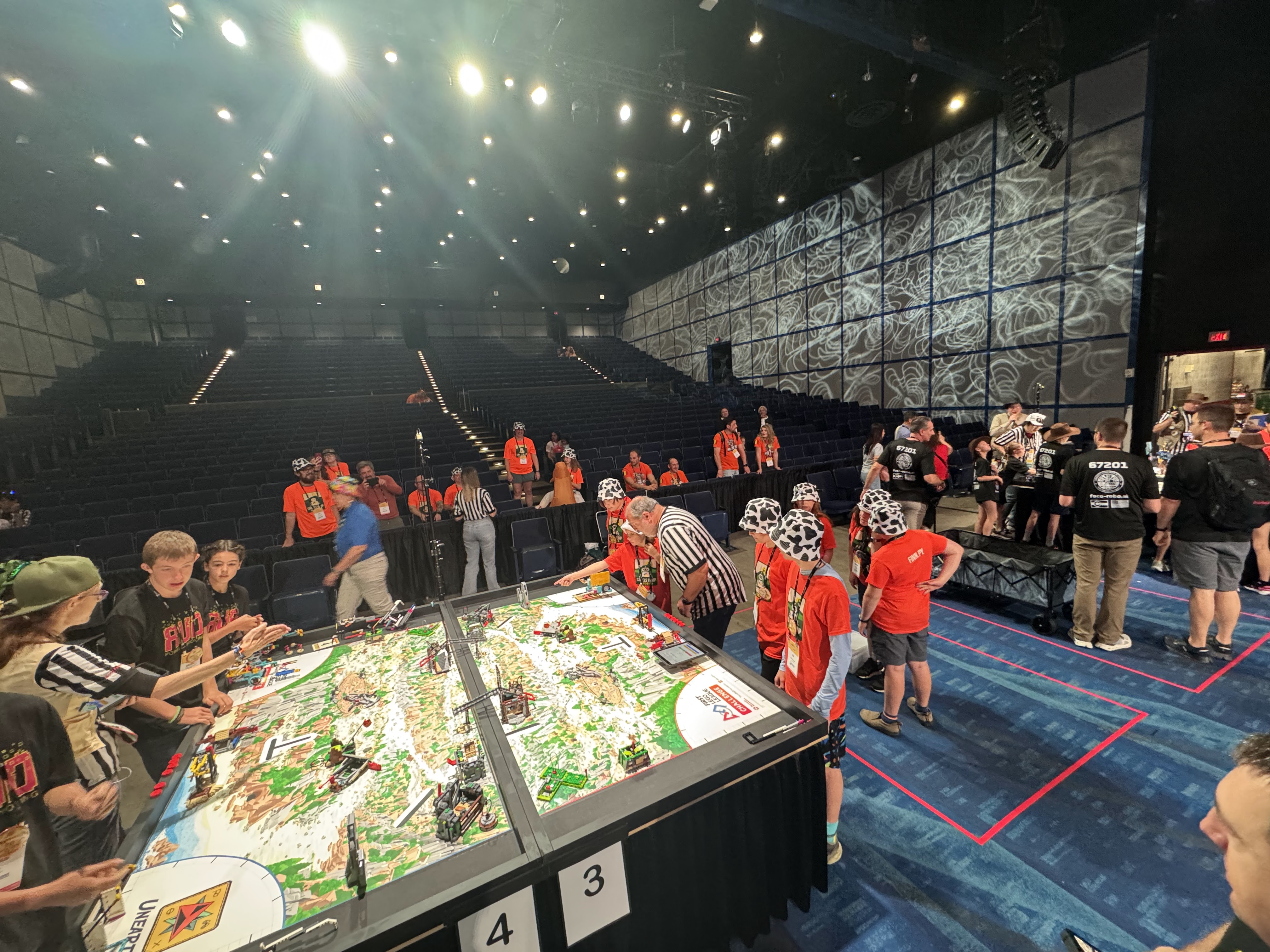 Teams competing at robot game tables during the World Championship
