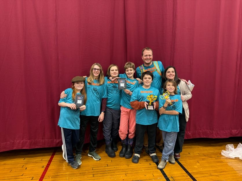 Camels Hump Coders holding awards after a competition